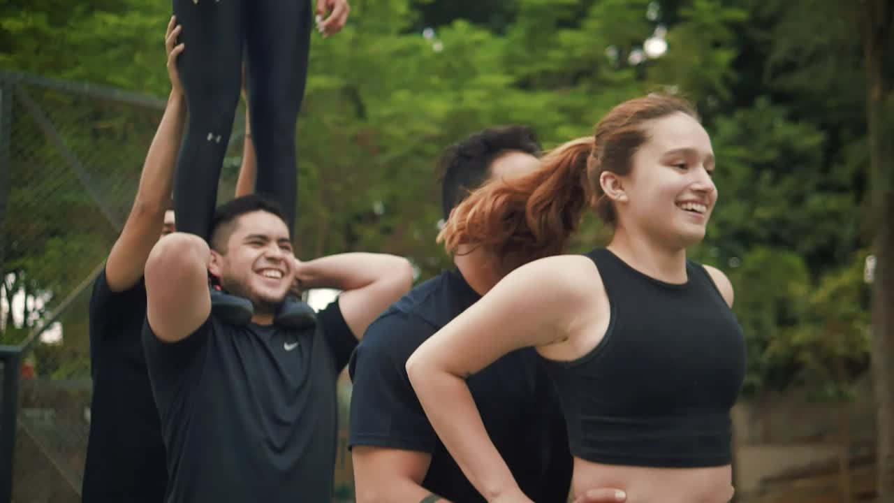 Video Stock Cheerleader Man Lifting A Girl With His Hands Live Wallpaper For PC - Free Download