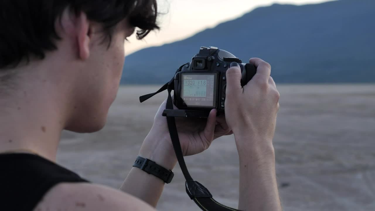 Stock Video Face Of A Boy Taking Pictures In A Desert Live Wallpaper For PC - Free Download