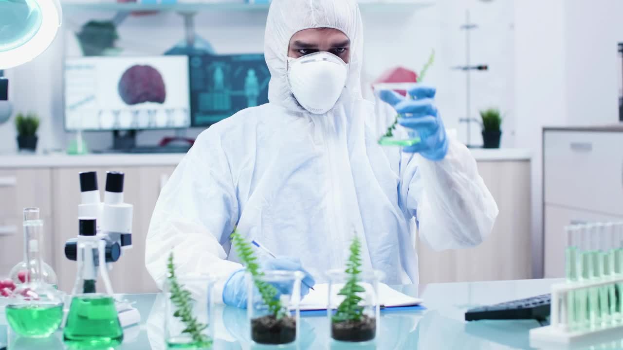 Free Stock Video Scientist Doing Research In Biology Lab With Face Mask Live Wallpaper - Free Download
