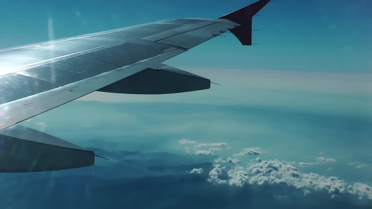 Free Video Stock the world seen from the window of an airplane Live Wallpaper - Free Download