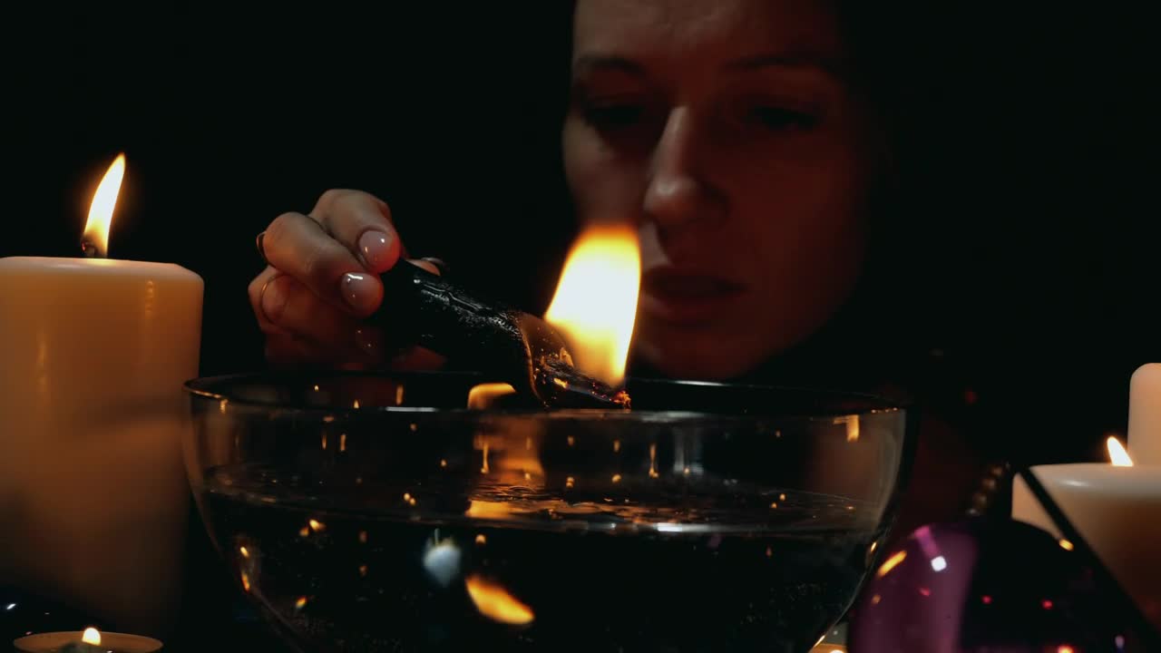 Free Stock Video Woman Doing A Ritual With A Candle Live Wallpaper - Free Download