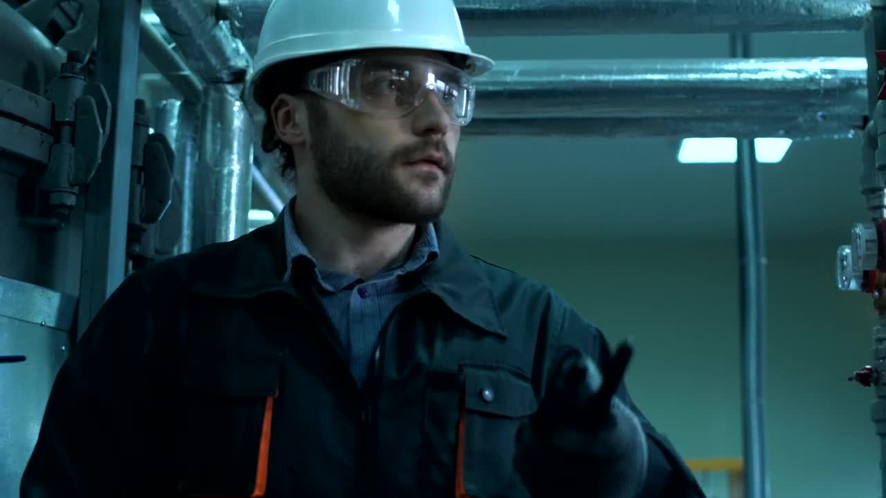 Stock Video Engineer Is Inspecting Pipes In The Lab Live Wallpaper For PC - Free Download