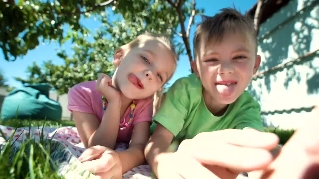 Stock Video Kids Grimacing In The Garden Animated Wallpaper - Free Download