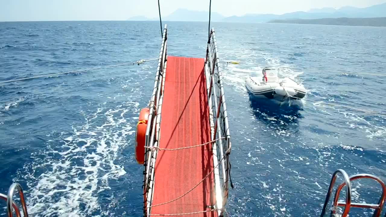 Free Video Stock Small Boat Behind A Large Yacht  LargeLive Wallpaper - Free Download