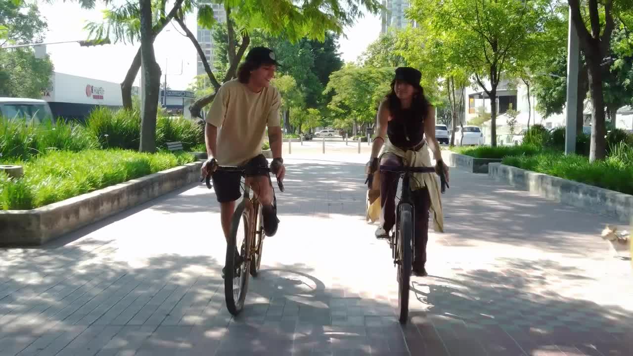 Stock Video Bike Ride Of A Couple Through A City Park Live Wallpaper For PC - Free Download