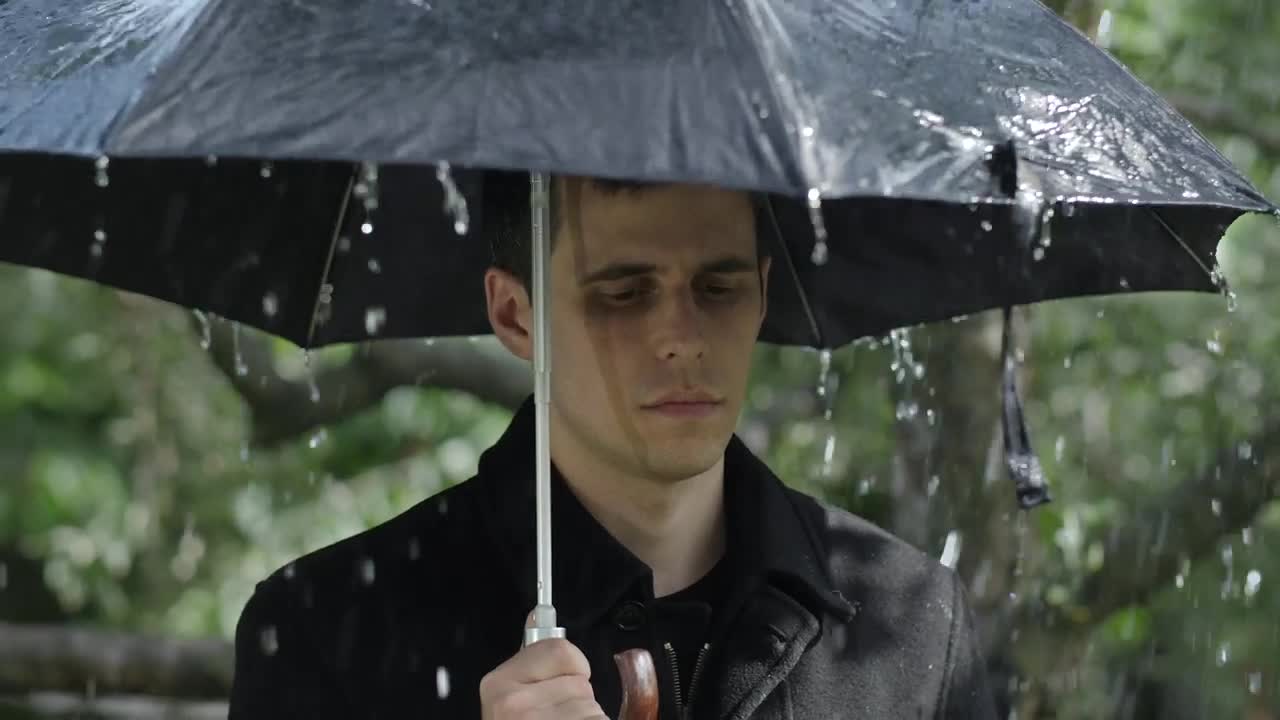 Free Stock Video Sad Man At A Funeral Raining With Umbrella Live Wallpaper - Free Download