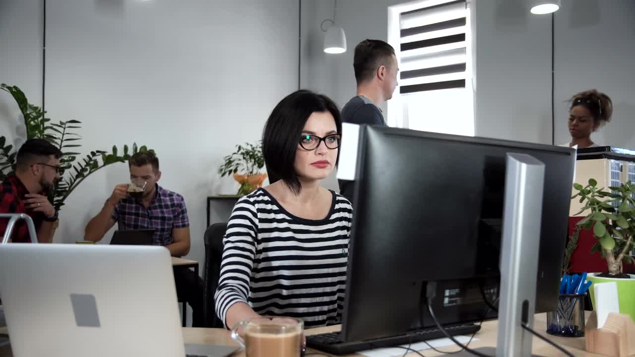 Stock Video Focused Woman Working On The Computer Live Wallpaper For PC - Free Download