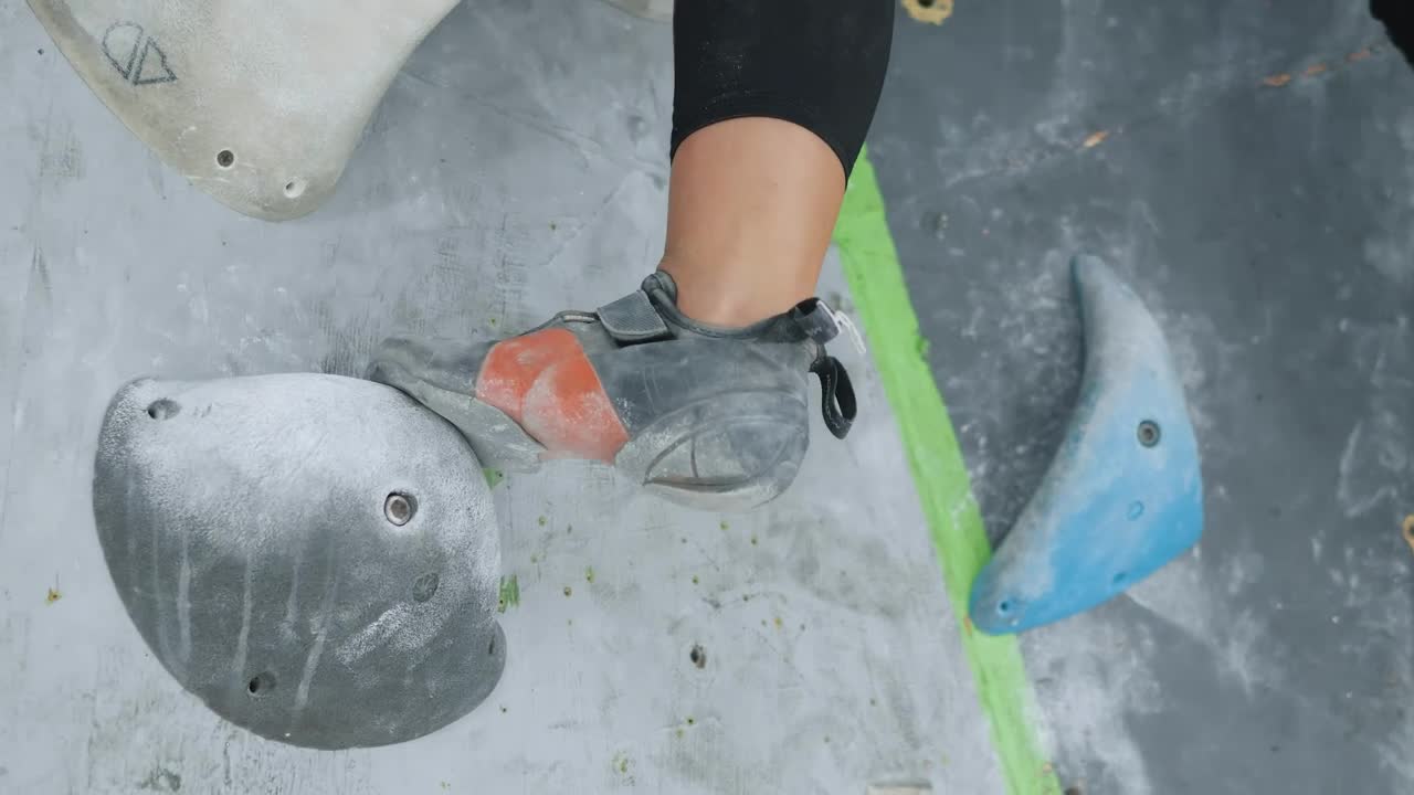 Stock Video Low Girl Climbing Up A Mountaineering Wall Animated Wallpaper - Free Download