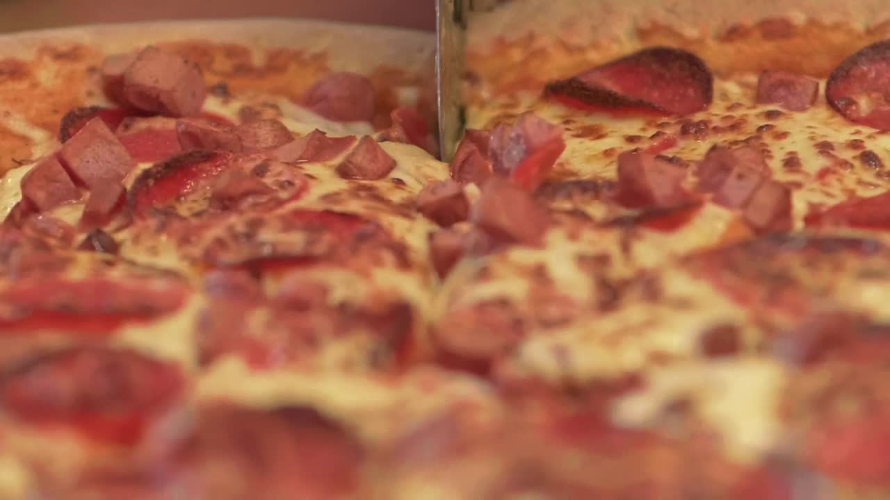 Stock Video Cutting A Pizza With A Pizza Cutter Live Wallpaper For PC - Free Download