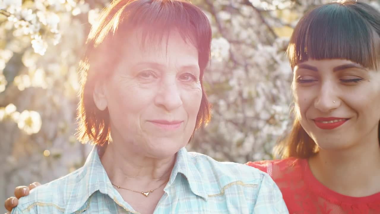 Stock Video Mother And Daughter Smiling Happily At Camer Animated Wallpaper - Free Download