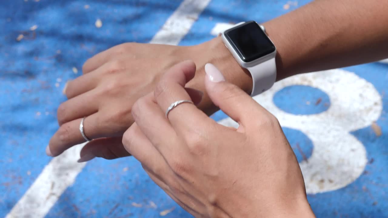Free Stock Video Woman Starting Her Stopwatch Before Running Live Wallpaper - Free Download