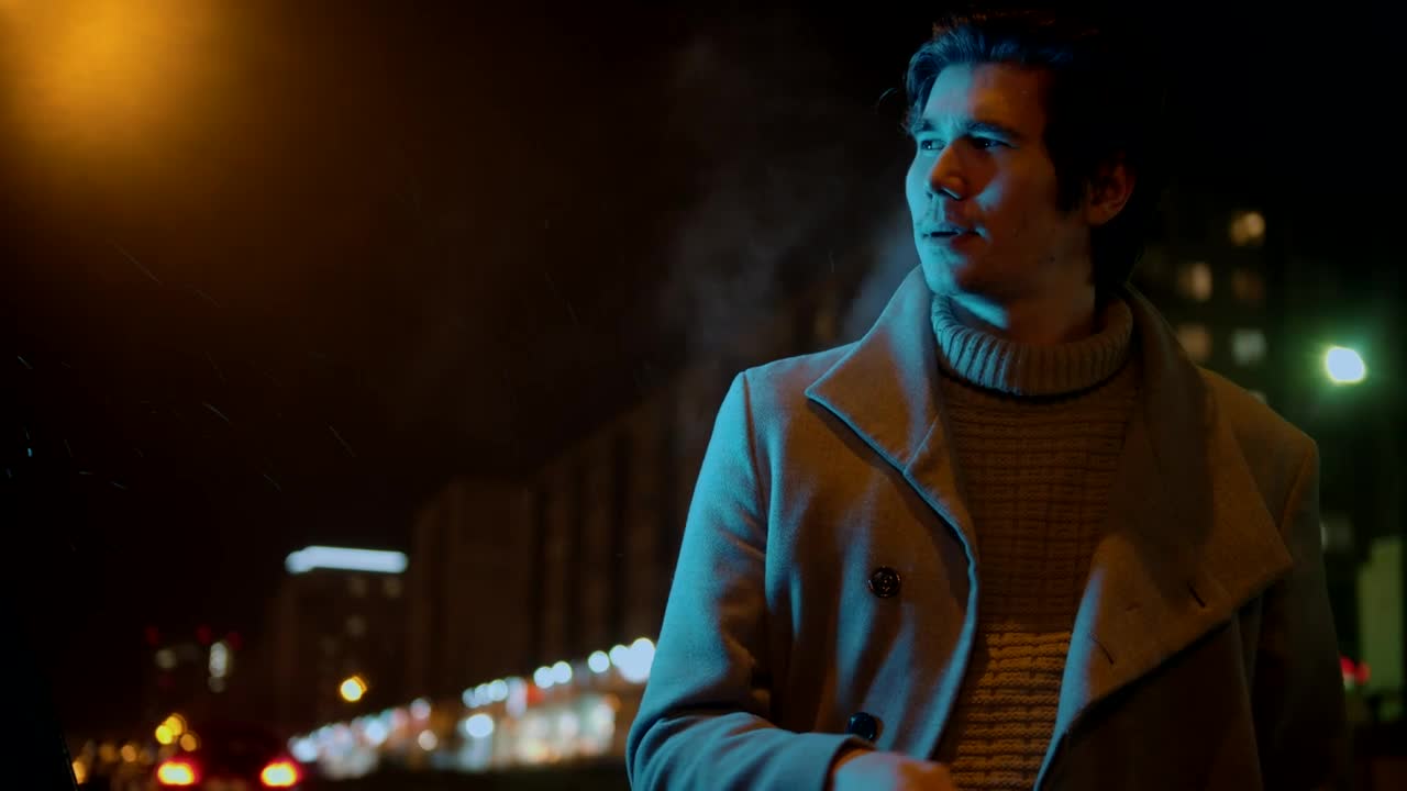 Stock Video Man Smoking In The Street On A Light Rainy Nigh Animated Wallpaper - Free Download