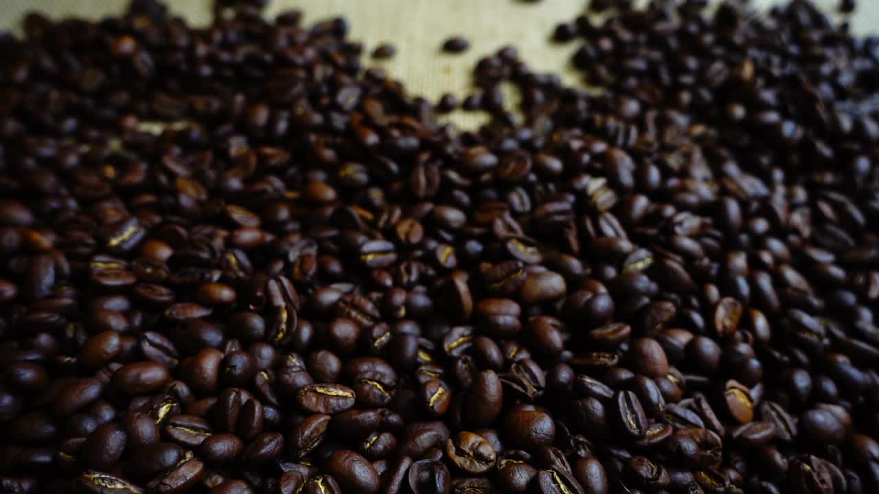 Free Video Stock toasted coffee beans on a sack Live Wallpaper - Free Download