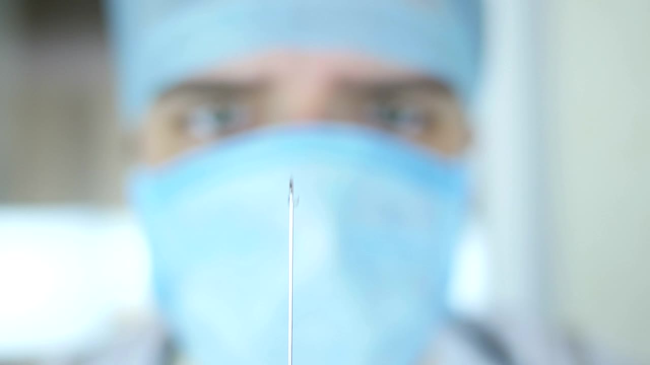 Stock Video Doctor Looking At The Syringe Live Wallpaper For PC - Free Download