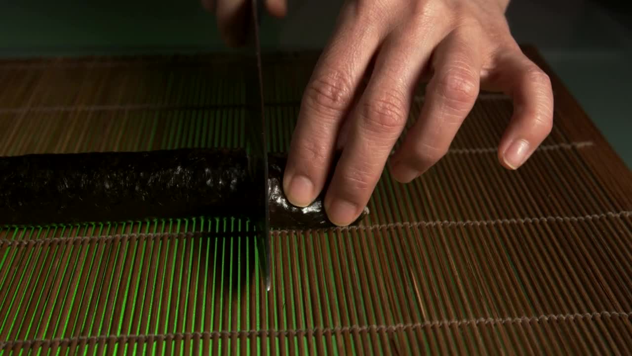 Free Video Stock sushi chef preparing a roll of sushi Live Wallpaper - Free Download