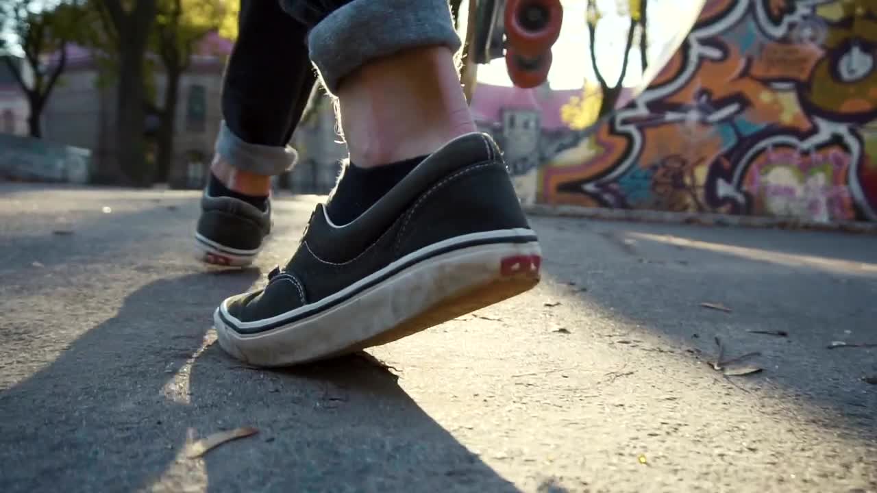 Free Stock Video Skateboarder Walking By In A Park Live Wallpaper - Free Download