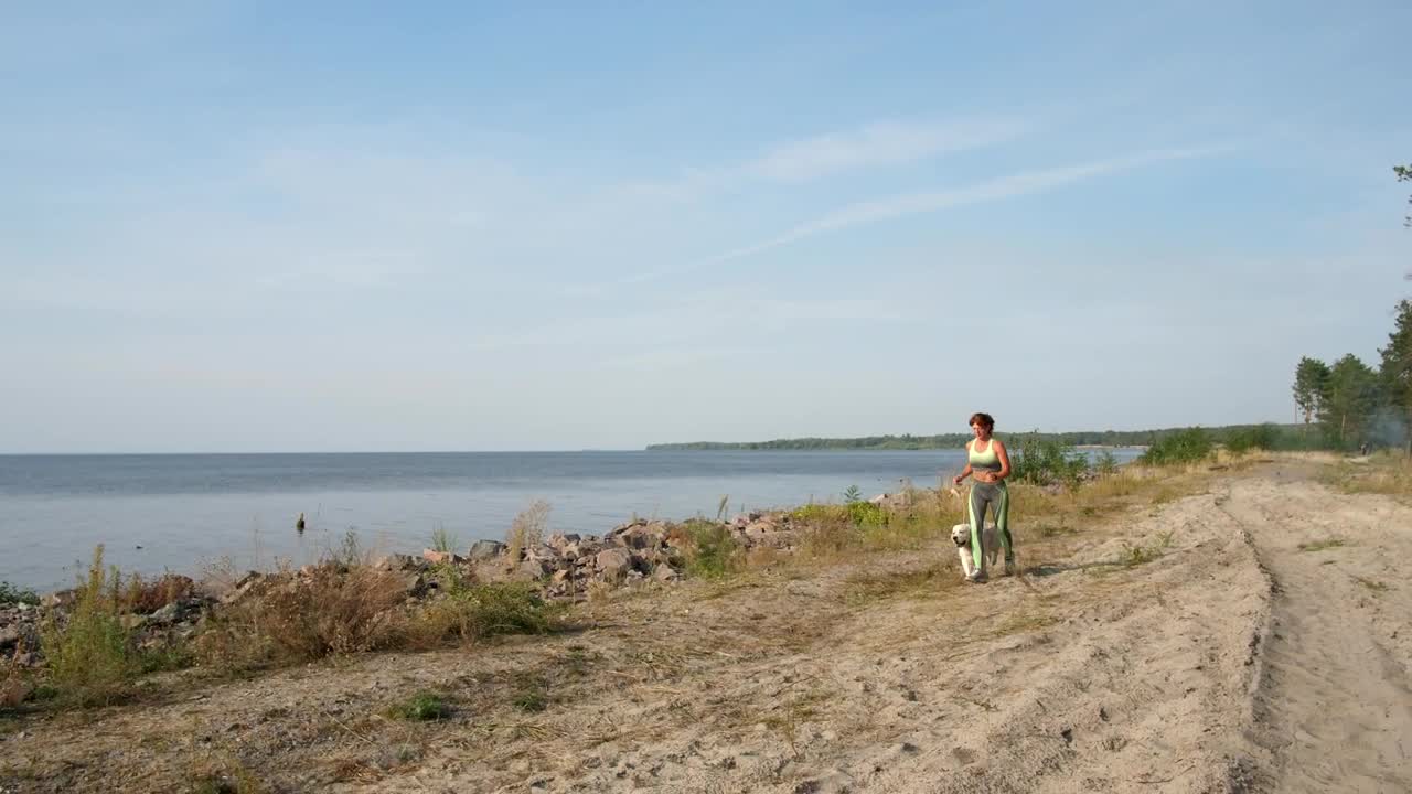 Stock Video Out For A Run With Her Pet Dog Live Wallpaper - Free Download