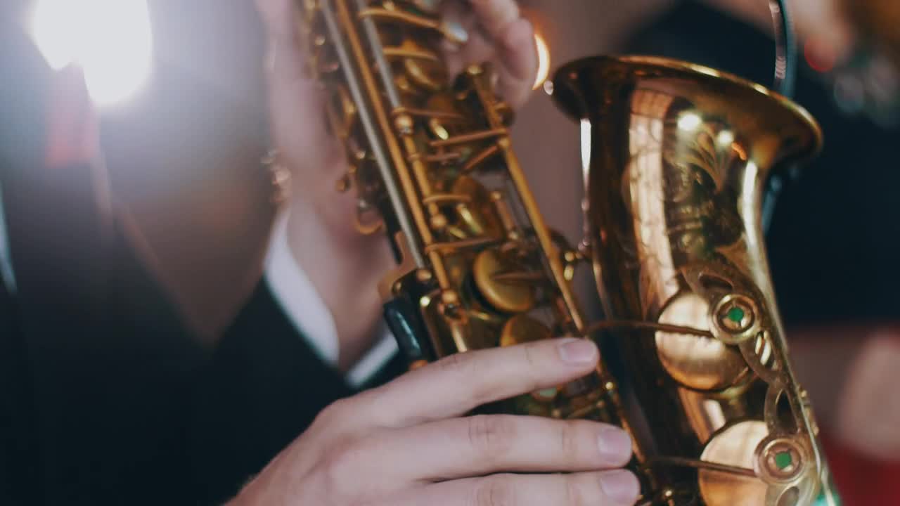 Free Stock Video Saxophonist Wearing A Jacket Live Wallpaper - Free Download