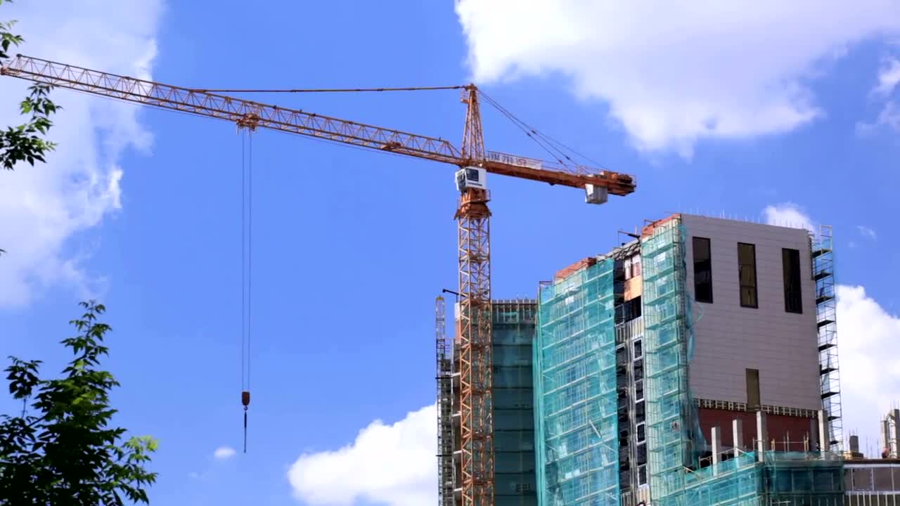 Stock Video Large Crane Over A Construction Site Animated Wallpaper - Free Download