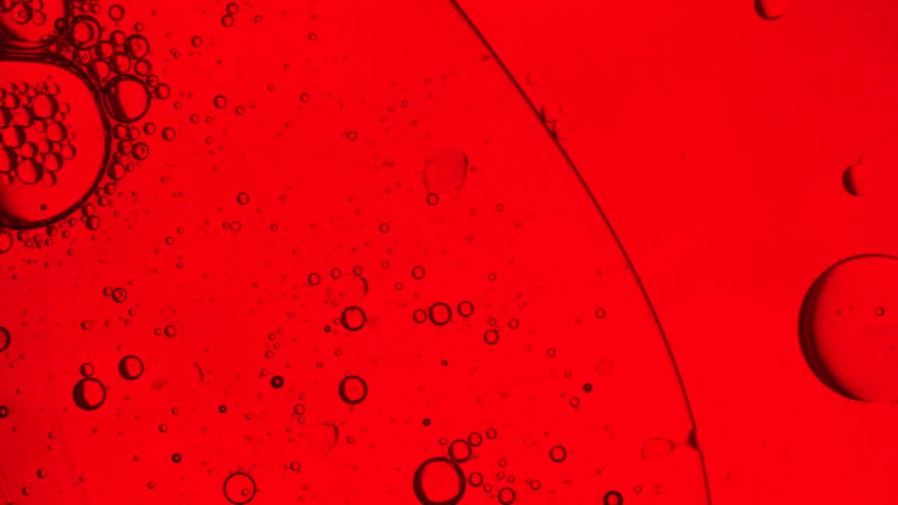 Free Video Stock Small Bubbles In A Liquid On A Red Background Live Wallpaper - Free Download