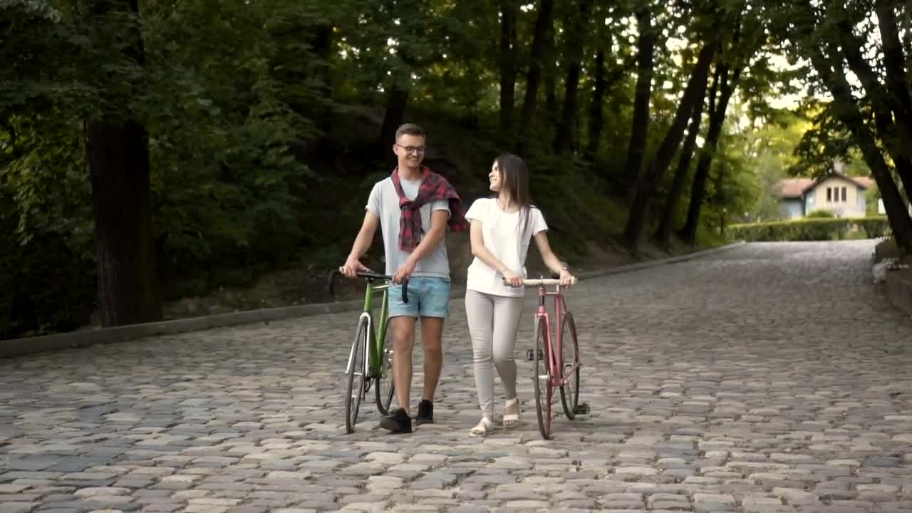 Stock Video Couple Walks In The Park While Talking Live Wallpaper For PC - Free Download