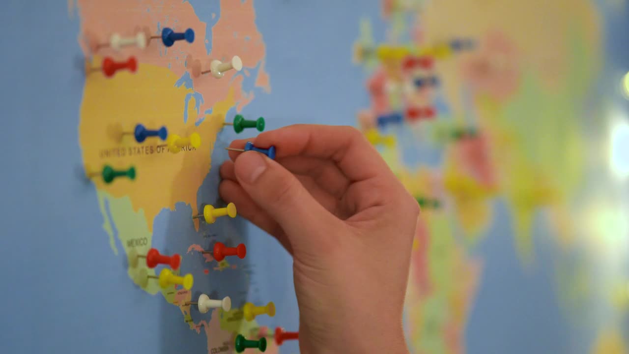 Video Stock Putting Thumbtacks On A World Map Board Live Wallpaper Free - Free Download