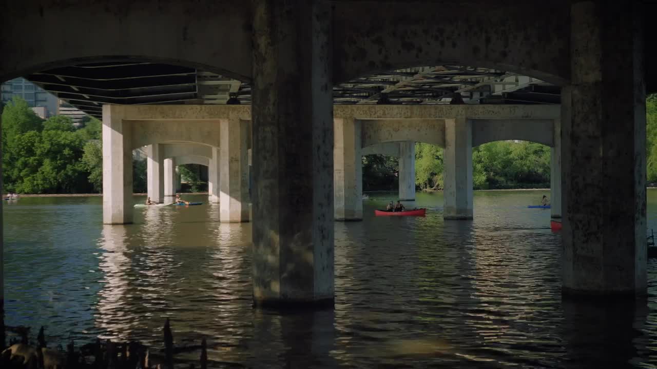 Stock Video People Sailing In A Motorboat Under A Bridge Live Wallpaper - Free Download