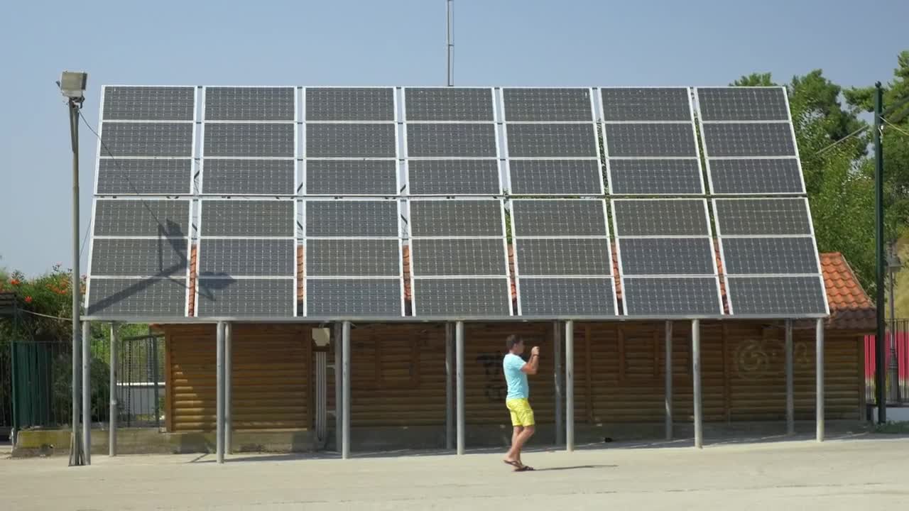 Stock Video Father And Son By A Solar Array Live Wallpaper For PC - Free Download