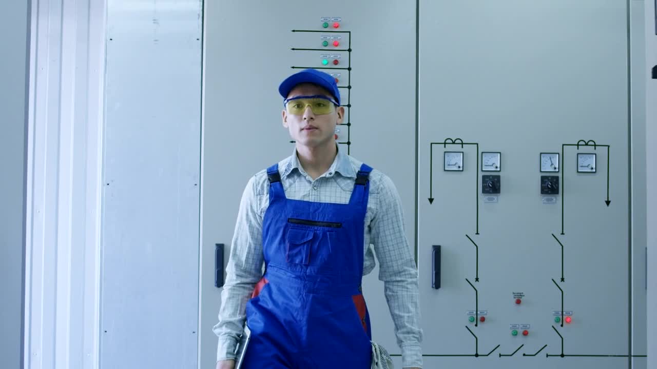 Stock Video Electrical Power Plant Worker In The Hallway Live Wallpaper For PC - Free Download