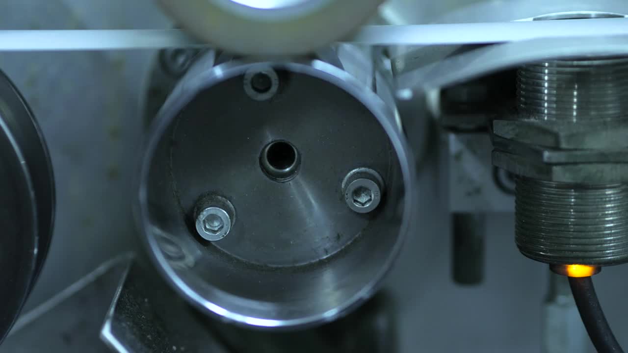 Stock Video Motor Of An Industrial Machine That Moves A Belt Live Wallpaper - Free Download