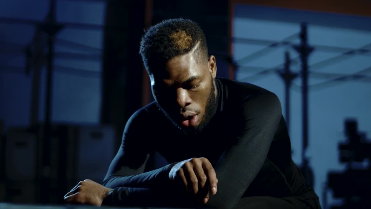 Stock Video Exhausted Athlete Catching His Breath Live Wallpaper For PC - Free Download