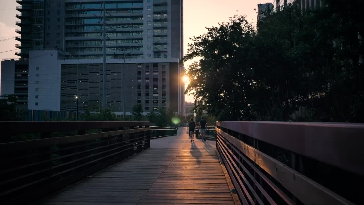 Stock Video Pedestrian Bridge In A City During Sunset Live Wallpaper - Free Download