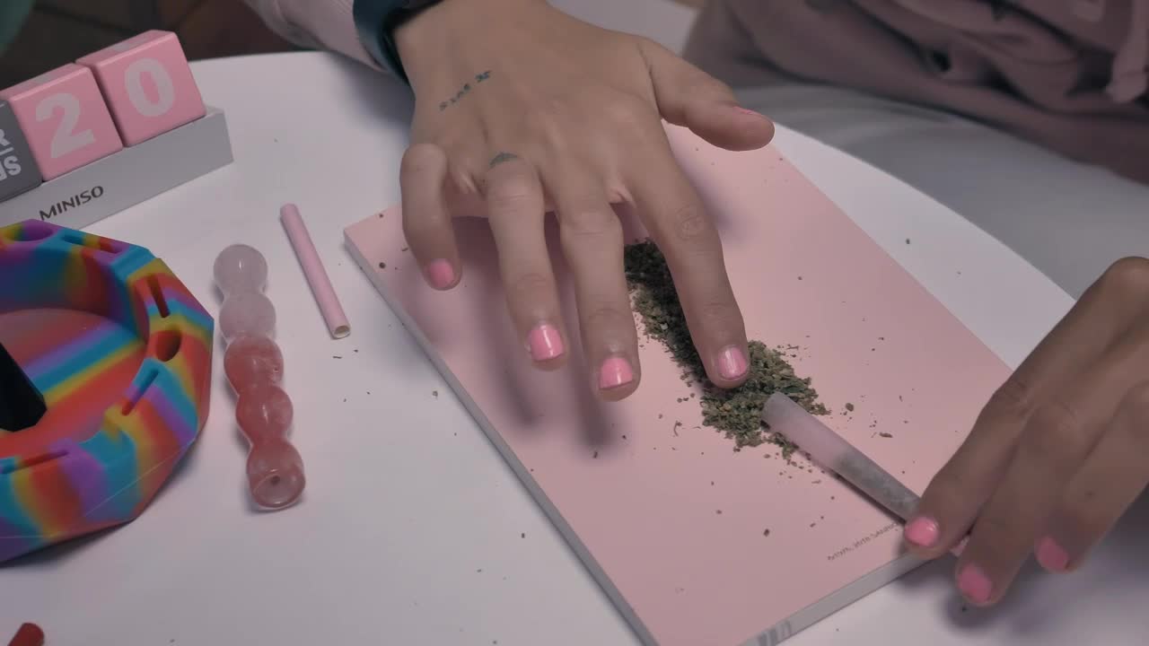 Free Stock Video Womans Hands Preparing A Marijuana Cigar Live Wallpaper - Free Download