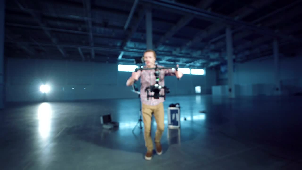 Video Stock Cameraman Walking With A Camera Stabilizer Live Wallpaper For PC - Free Download