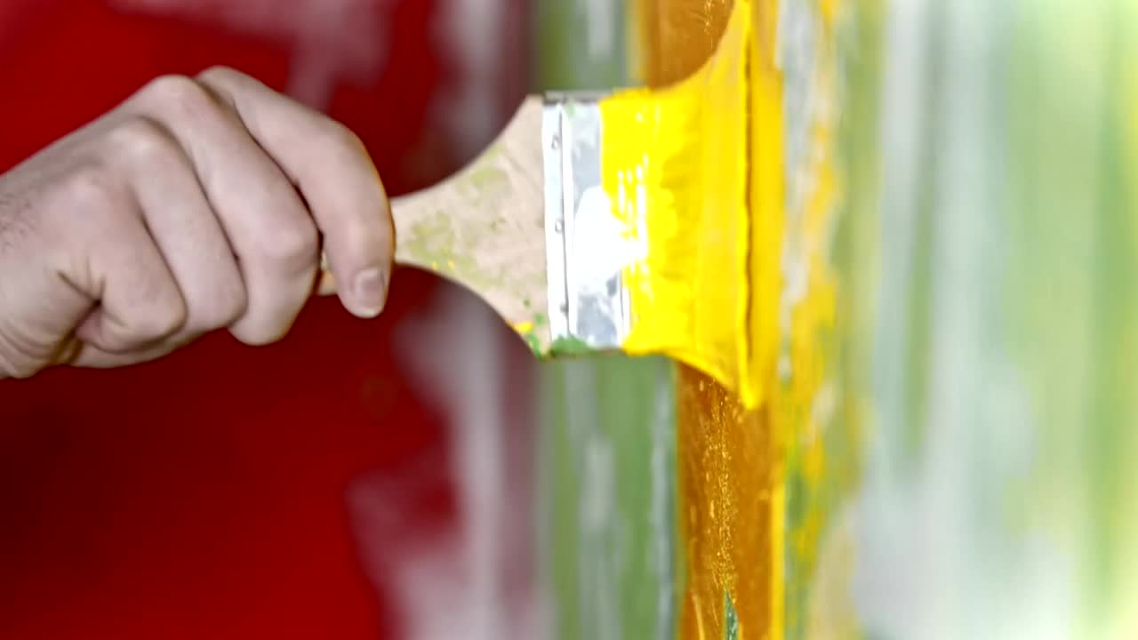 Stock Video Hand Of A Painter Painting A Wall With A Brush Live Wallpaper For PC - Free Download