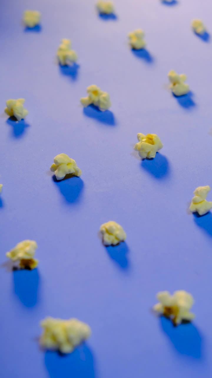 Video Stock Popcorn On A Blue Surface Changing Size In Stop Motion Live Wallpaper Free - Free Download
