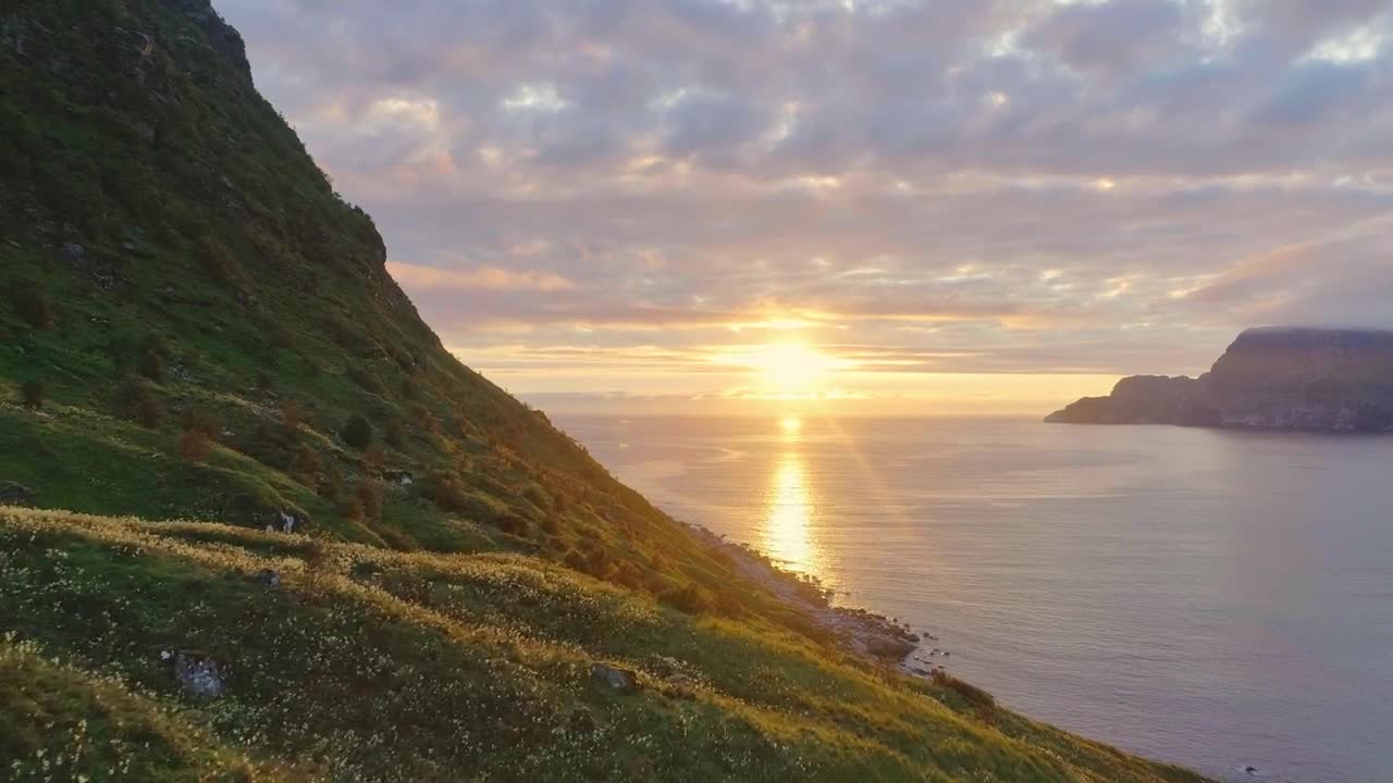 Stock Video Flyover Lush Spring Hillside Toward Sunset On Sea Live Wallpaper For PC - Free Download