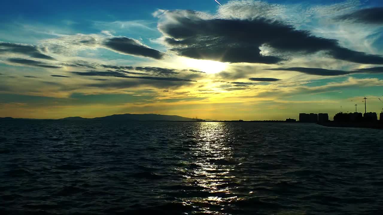 Free Video Stock the sea the sky and a city on horizon Live Wallpaper - Free Download