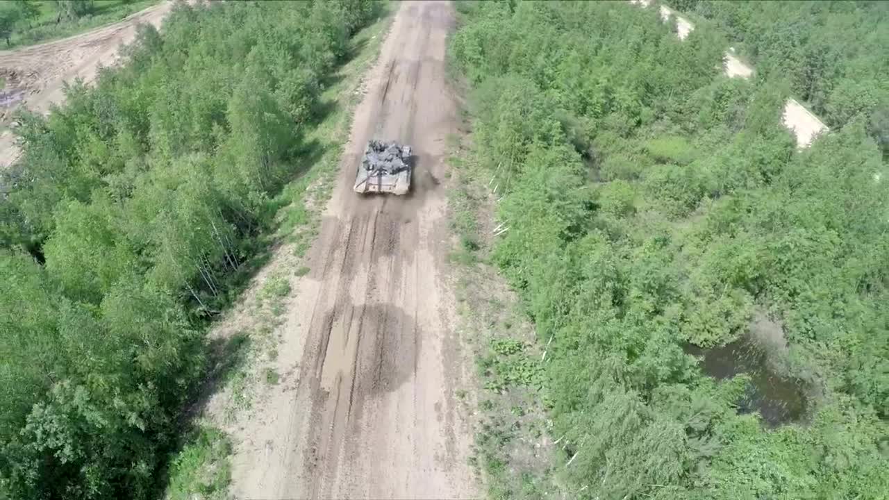Free Video Stock tank driving over rough terrain Live Wallpaper - Free Download