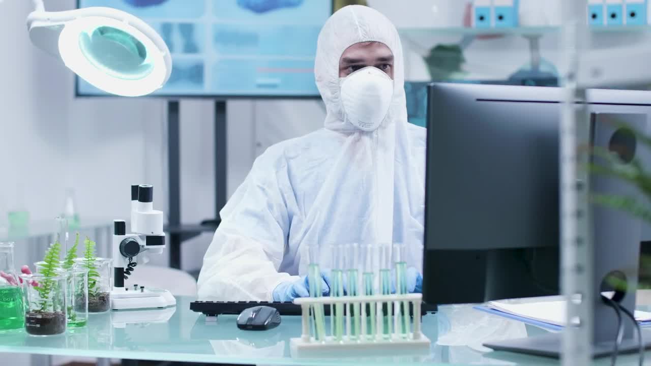 Free Stock Video Researcher In Full Protective Clothing Live Wallpaper - Free Download