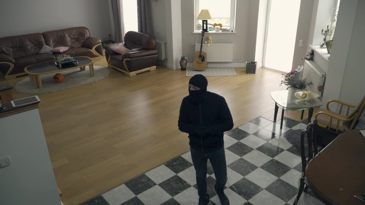 Free Video Stock thief creep through house and looks up at camera Live Wallpaper - Free Download