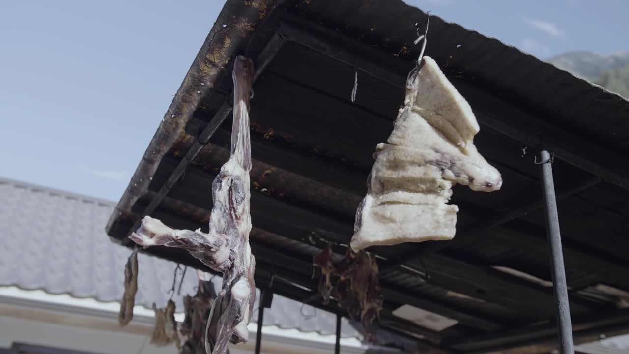 Stock Video Jerky Drying Under A Metal Roof Animated Wallpaper - Free Download