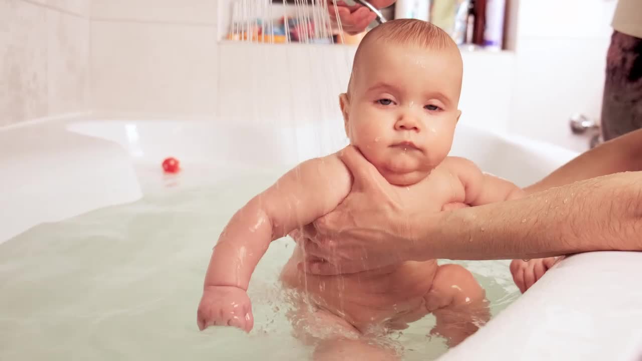Stock Video Happy Baby Being Bathed In The Tub Animated Wallpaper - Free Download