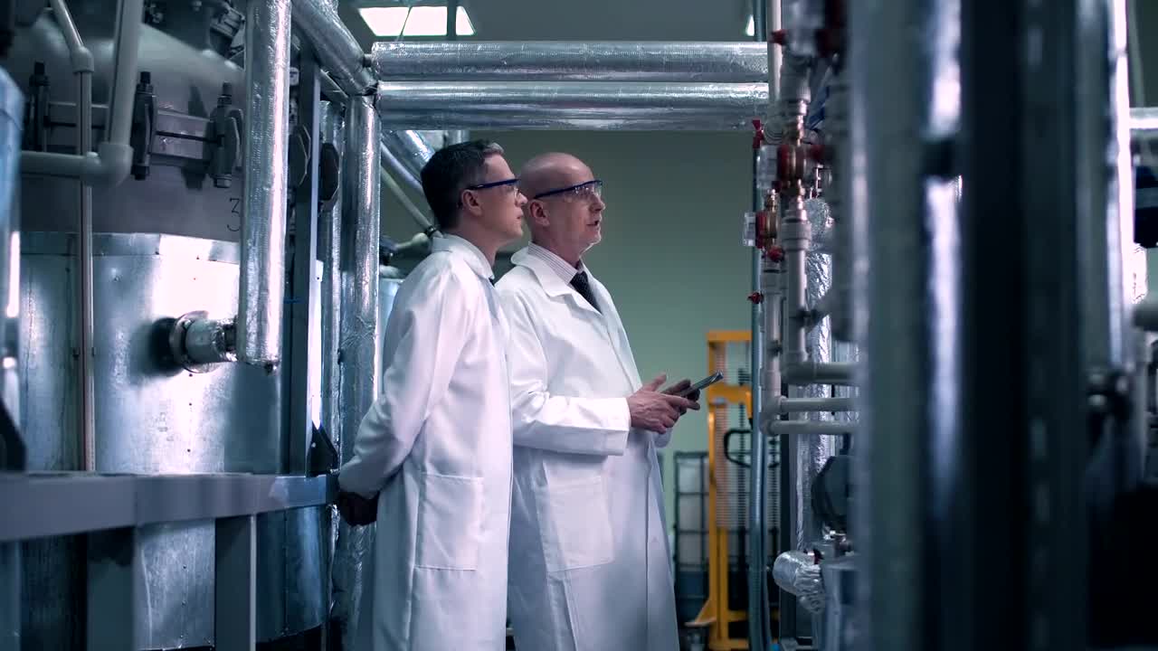 Free Stock Video Scientists Looking At Laboratory Pipes Live Wallpaper - Free Download