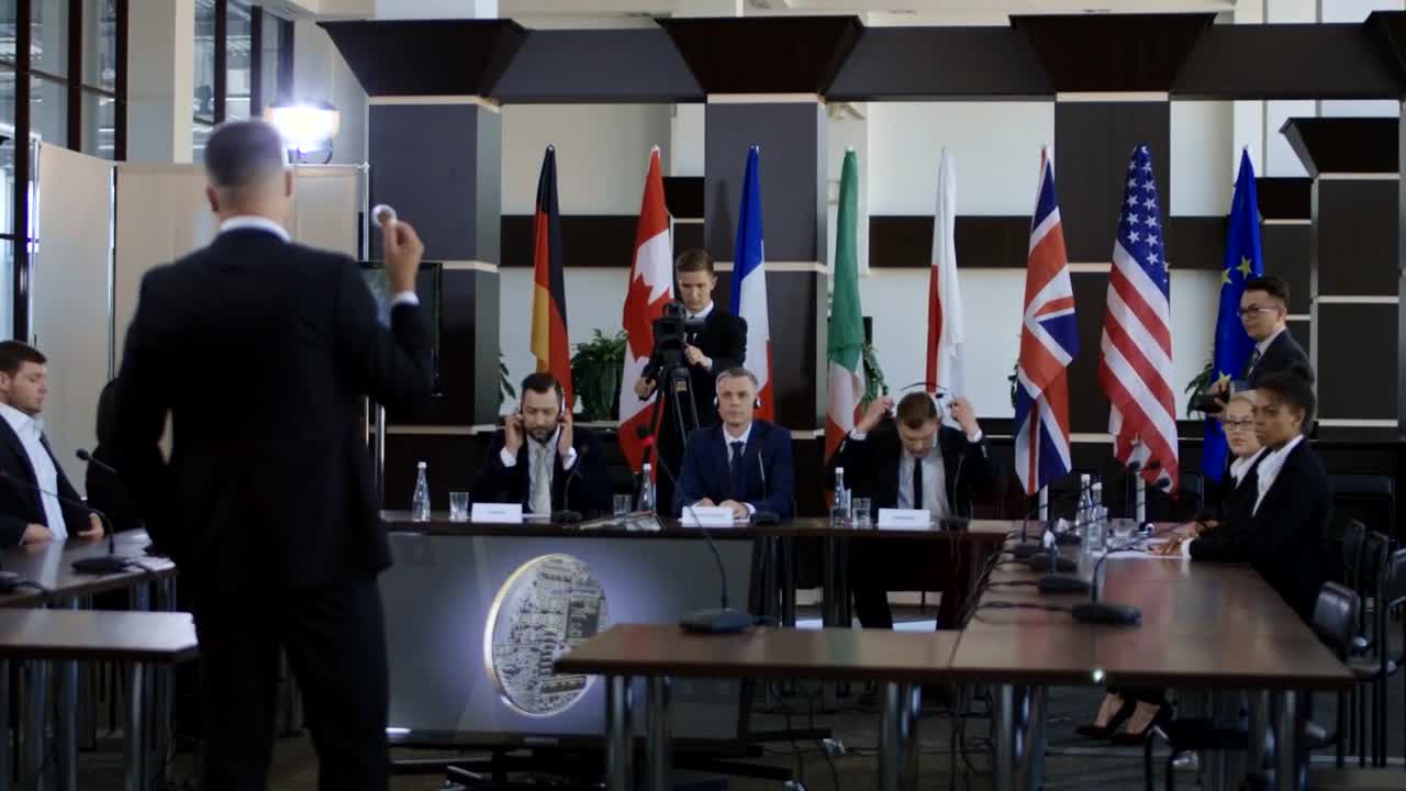 Stock Video Members Of The Conference Discussing Bitcoi Animated Wallpaper - Free Download