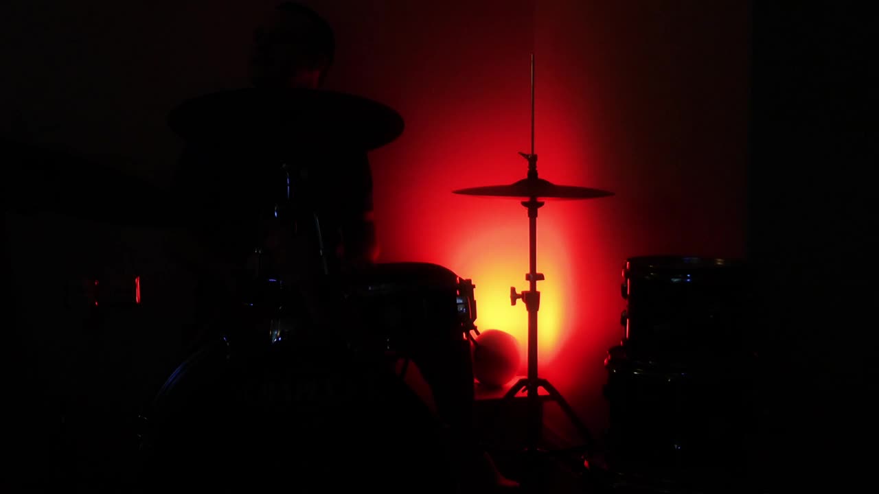 Video Stock Playing Drums In The Dark Under Colored Light Live Wallpaper Free - Free Download