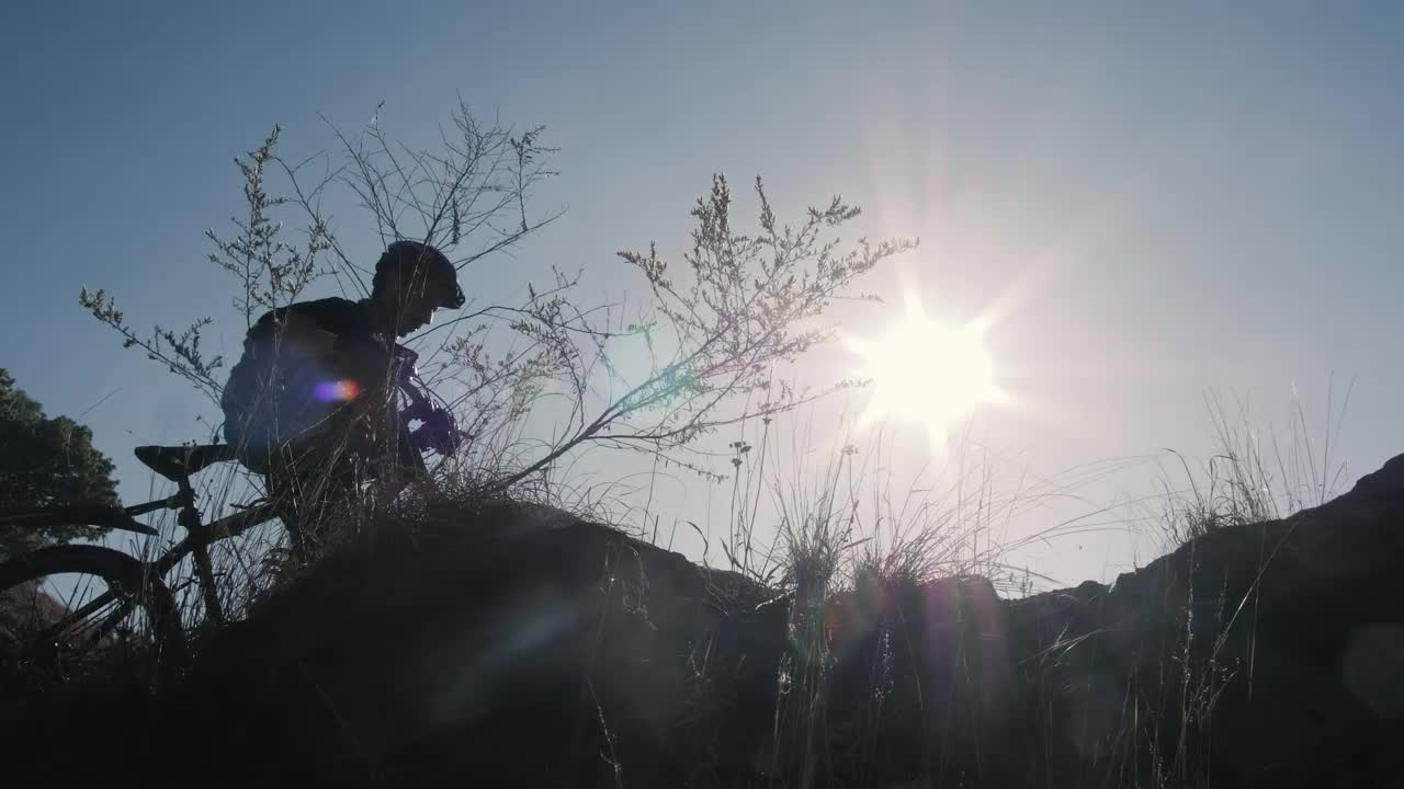Free Stock Video Silhouette Of A Cyclist In Front Of The Sun In Live Wallpaper - Free Download