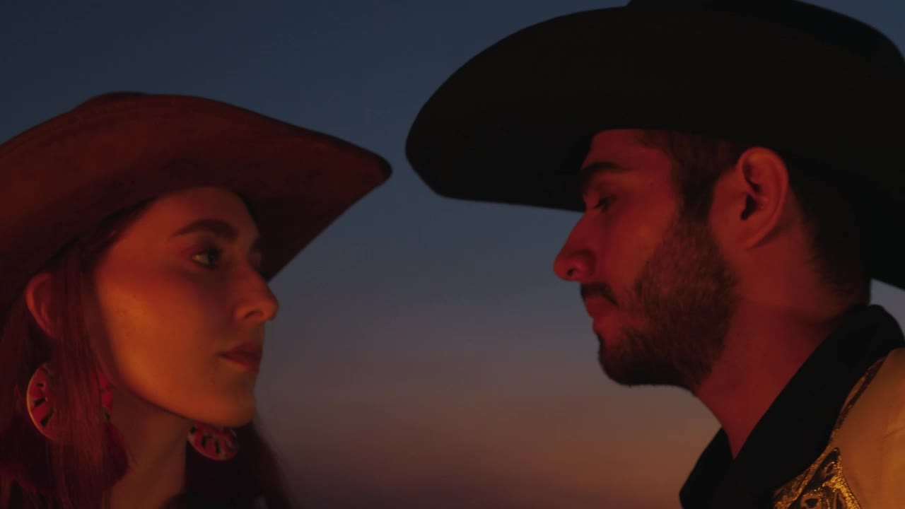 Stock Video Mexican Style Couple Looking At Each Other At Sunse Animated Wallpaper - Free Download