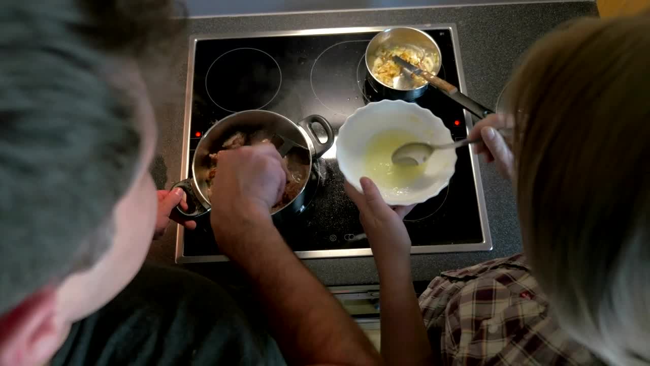 Stock Video Couple Preparing A Meal Together Live Wallpaper For PC - Free Download