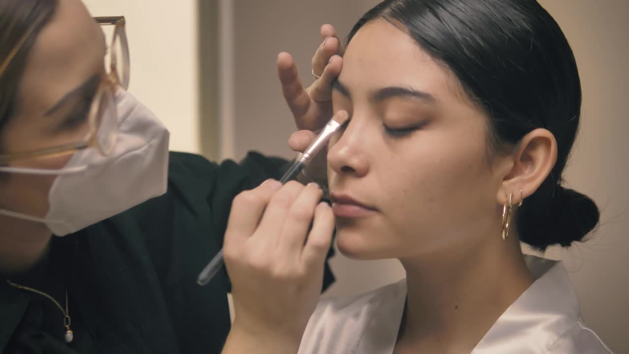 Stock Video Makeup Artist Working On The Face Of A Bride Animated Wallpaper - Free Download